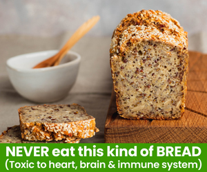 loaf of bread, a slice, and a bowl with a wooden spoon on a table.